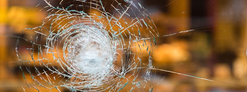 glass with spiderweb cracks