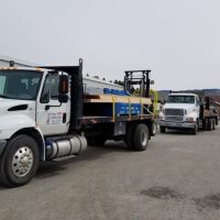loaded lake chelan building supply delivery trucks